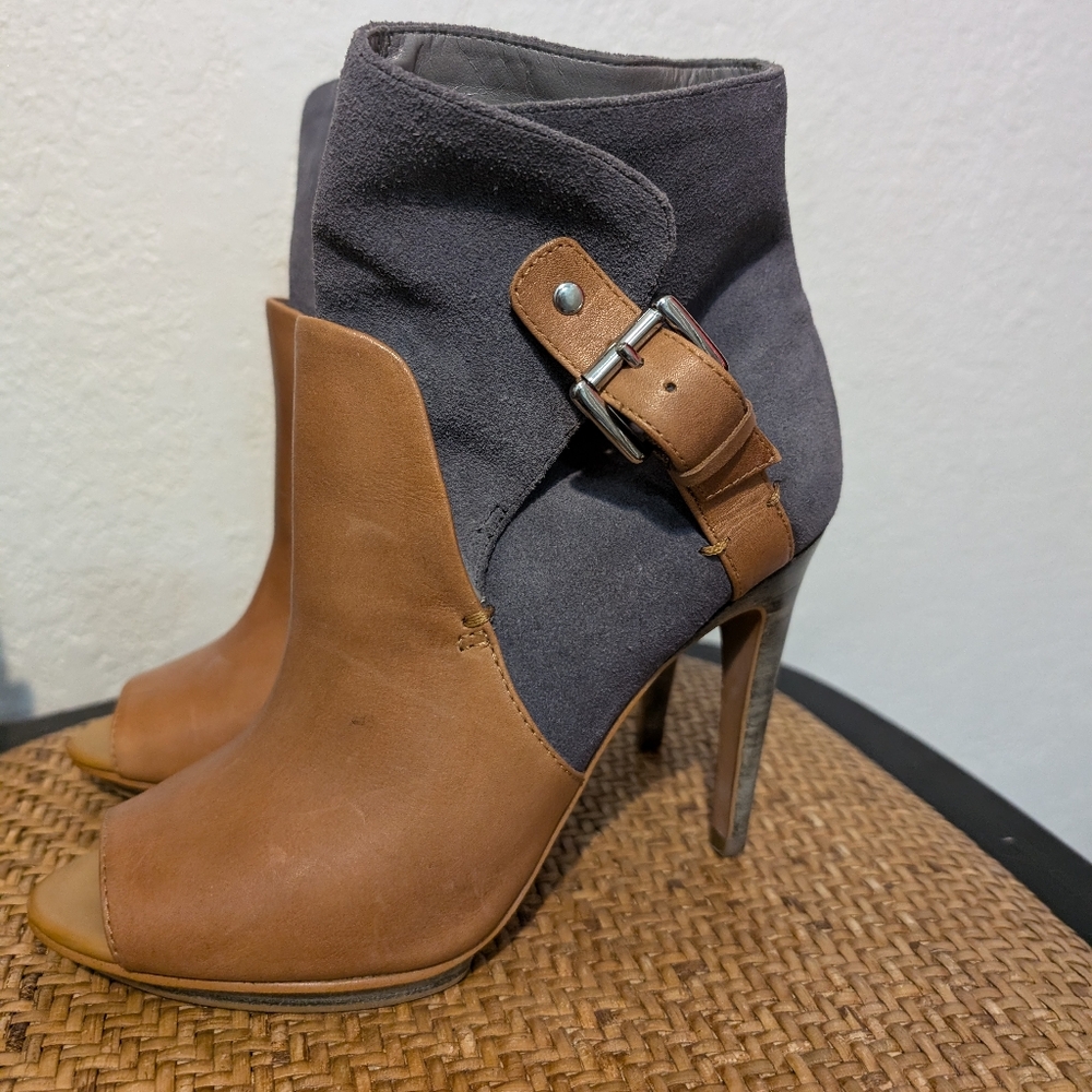 Luxury rebel open toe buckled booties boots.